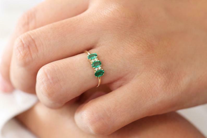 "Elegant Emerald Zircon Ring with Natural Diamond Accents"