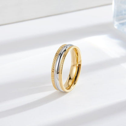 "Sparkling Duo: Gold and Silver Ring for Subtle Glamour"