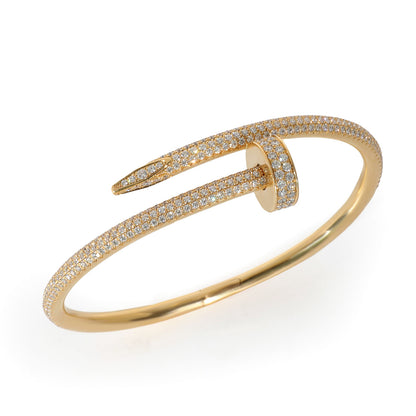 "The round bangle adorned with a sparkling zircon stone."