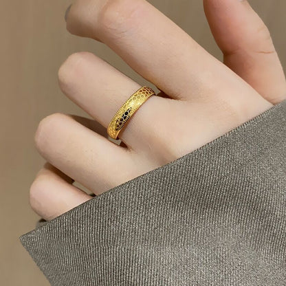 "Golden Gleam: Captivating Round Gold Ring for Timeless Charm"