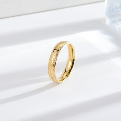 "Golden Gleam: Captivating Round Gold Ring for Timeless Charm"