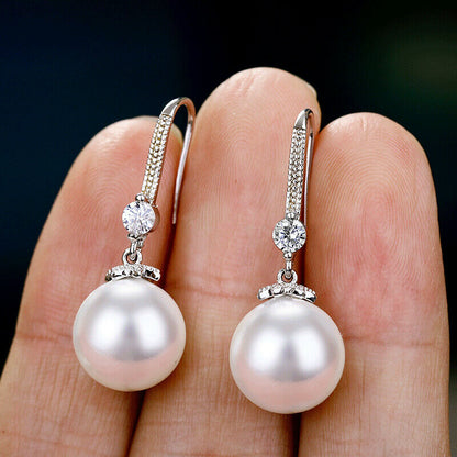 "The Perfect Pair: Pearl and Zircon Earrings for Effortless Elegance"