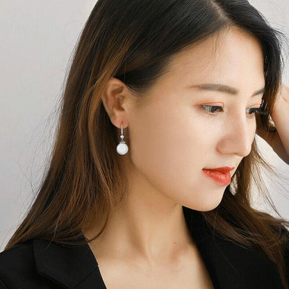 "The Perfect Pair: Pearl and Zircon Earrings for Effortless Elegance"