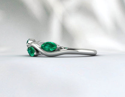 "The Regal Green: An Emerald and Zircon Gemstone Ring"