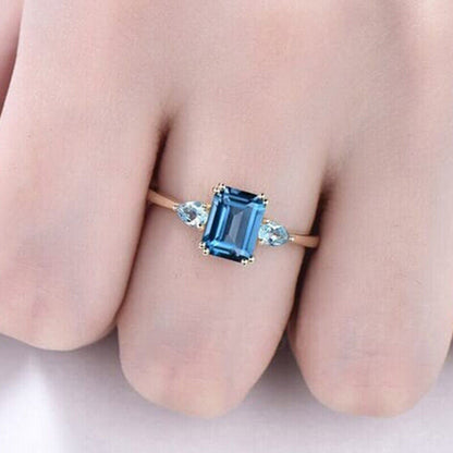 "Sapphire Sparkle: A Dazzling Blue Topaz Ring"