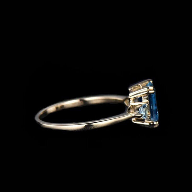 "Sapphire Sparkle: A Dazzling Blue Topaz Ring"