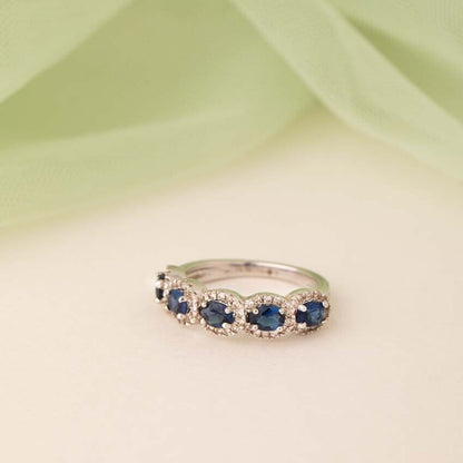 "Heavenly Blue: A Sapphire and Zircon Gemstone Ring"