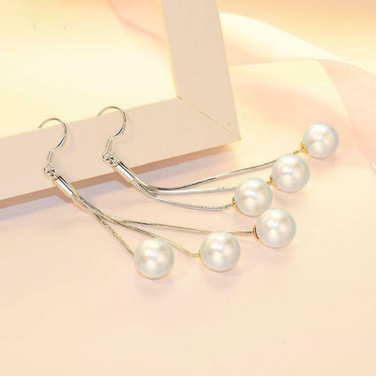 "Glamorous Silver Pearl Tassel Earrings: 6.8cm Length"