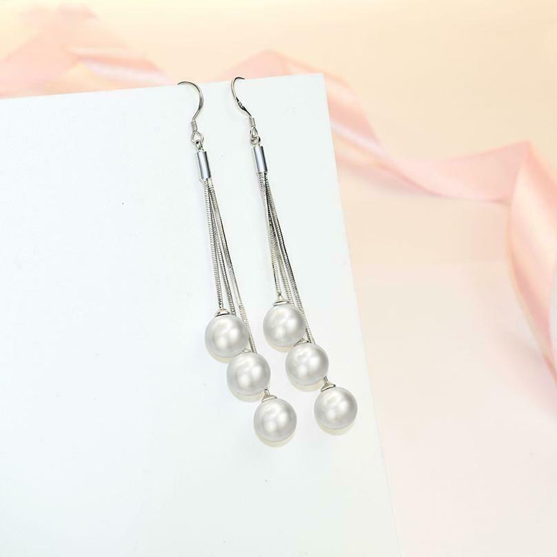 "Glamorous Silver Pearl Tassel Earrings: 6.8cm Length"