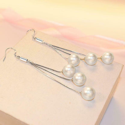 "Glamorous Silver Pearl Tassel Earrings: 6.8cm Length"